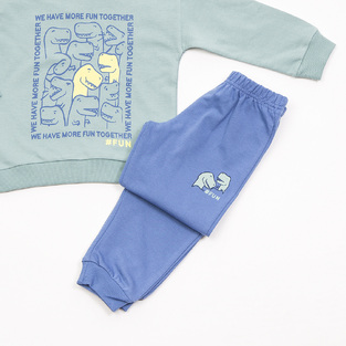 Seasonal set of TRAX tracksuit in mint color with embossed dinosaur print.