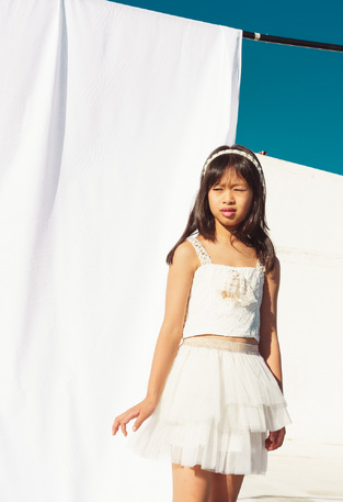 EBITA skirt set in off-white color with lace details.