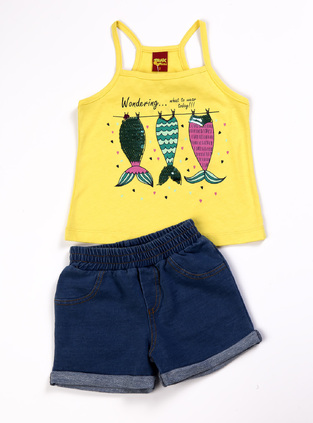 Set of TRAX shorts, yellow sleeveless top and denim shorts.