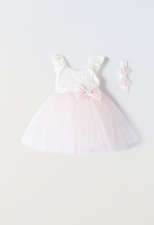 EBITA dress in pink color with tulle trim.