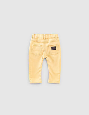 IKKS jeans in yellow color with distinctive print.