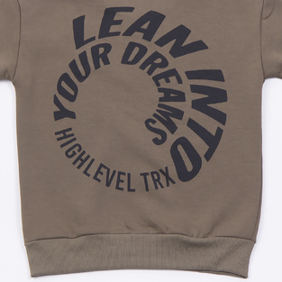 TRAX tracksuit set in khaki color with embossed "LEAN INTO YOUR DREAMS" logo.