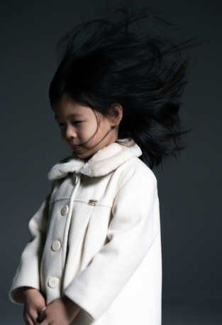 EBITA coat in off-white color with fur on the collar