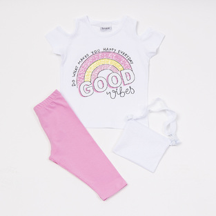 TRAX capri leggings set in white with "GOOD VIBES" logo and purse.