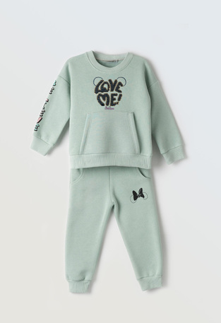 EBITA tracksuit set in beige color with embossed "LOVE ME" logo.