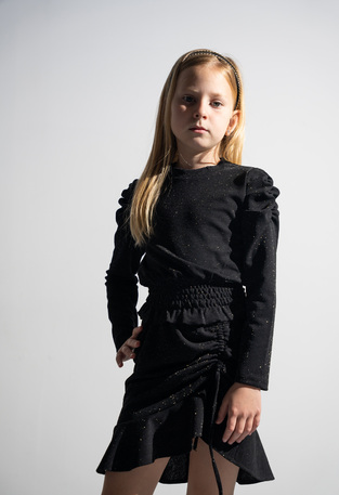 EBITA skirt set in black with glitter.