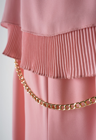 EBITA jumpsuit in pink color with a pleated design.