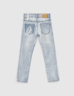 IKKS stonewashed blue jeans.