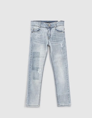 IKKS stonewashed blue jeans.